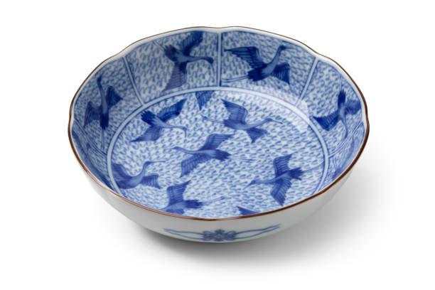 istock Traditional Japanese blue and white bowl decorated with cranes on white background 1455010878