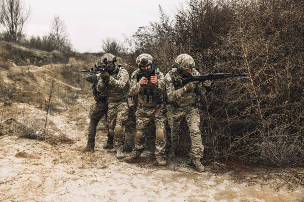 istock Group of soldiers before the attack 1455010965