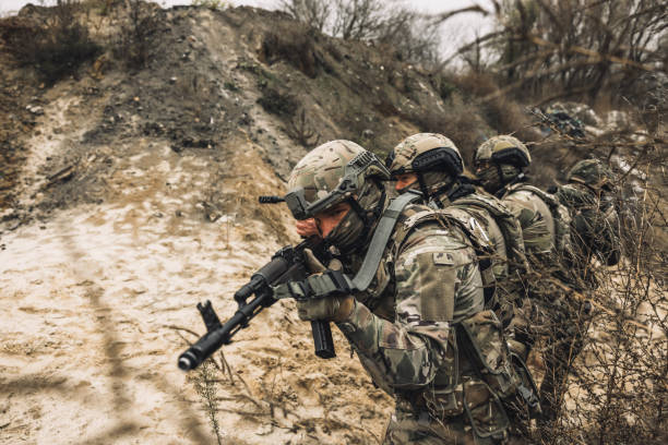 istock Group of soldiers before the attack 1455010966