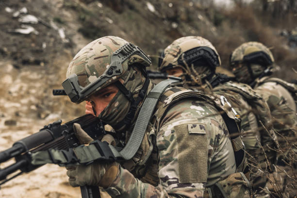 istock Group of soldiers before the attack 1455010969