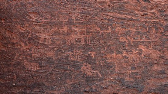 Some talmudic rock carvings depicting a battle. The drawings are on a rock-face in Saudi Arabia