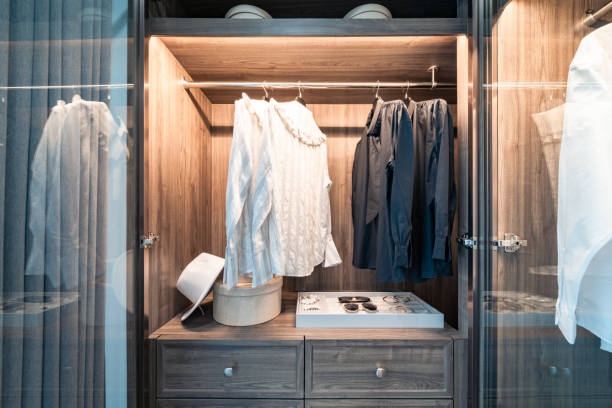 istock Clothes on clothes rail in wardrobe 1455011982