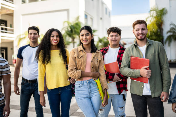 istock Portrait of young students at university 1455012392
