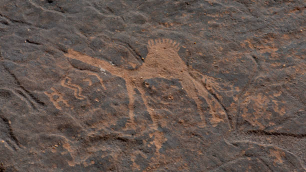 istock rock carving depicting a camel 1455015711