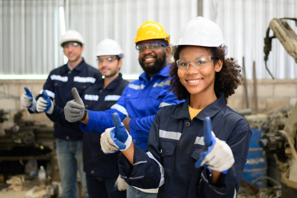 istock Female engineer worker with worker team at factory, Teamwork with success 1455016147