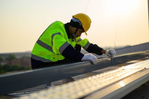 worker with safety helmet checking and operating system at solar cell farm power plant, renewable energy source for electricity and power, solar cell maintenance concept - solar power station solar panel energy electrician imagens e fotografias de stock