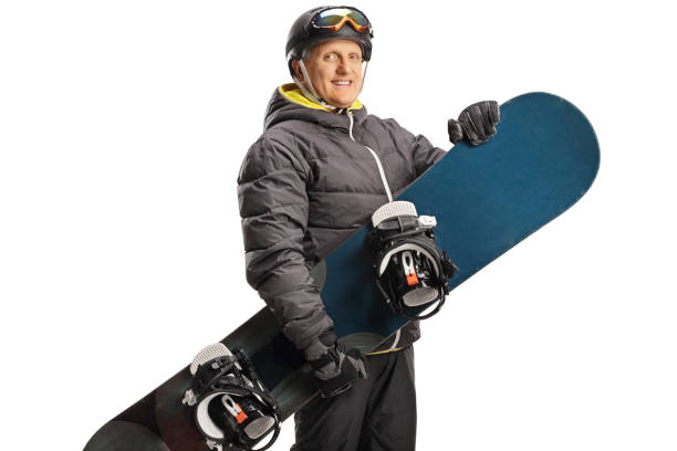istock Mature man with a snowboarding equipment 1455022369
