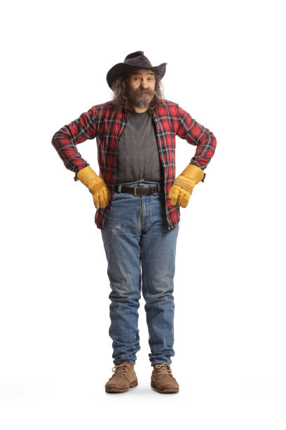 istock Cowboy farmer in jeans and shirt 1455022397