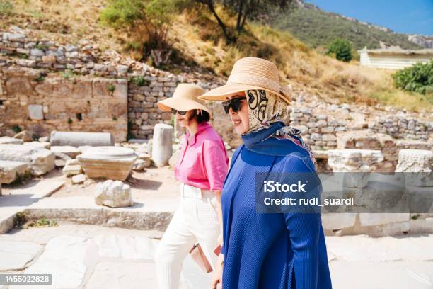 Tourist Senior Women Enjoy Exploring The Ancient City Of Ephesus Stock Photo - Download Image Now