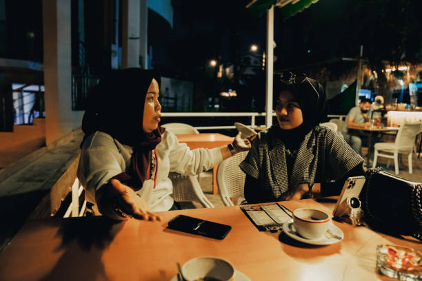 istock asian women enjoying dinner in restaurant 1455023588