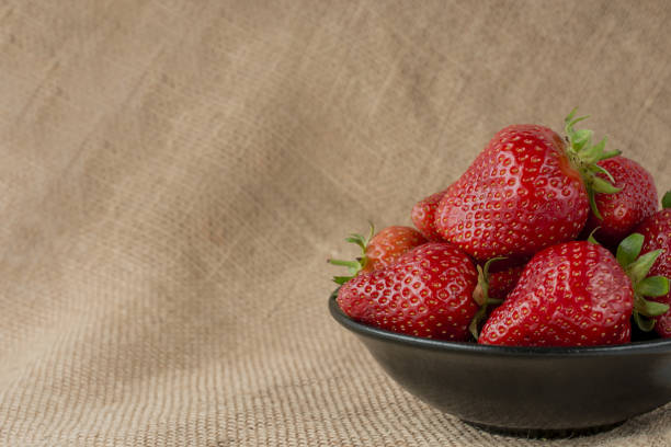 istock Fresh and ripe strawberries on  background. 1455024359