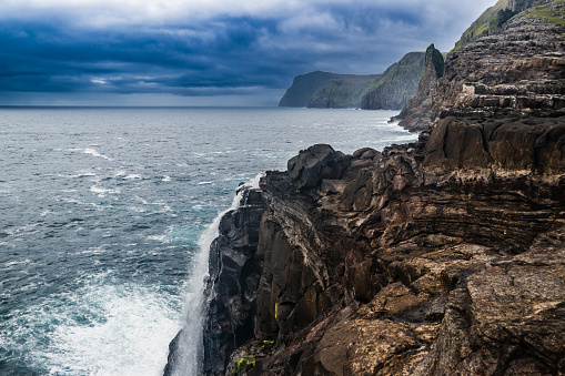 View on Bosdalafossur waterfall at Vagar island at summer, Faroe Islands.