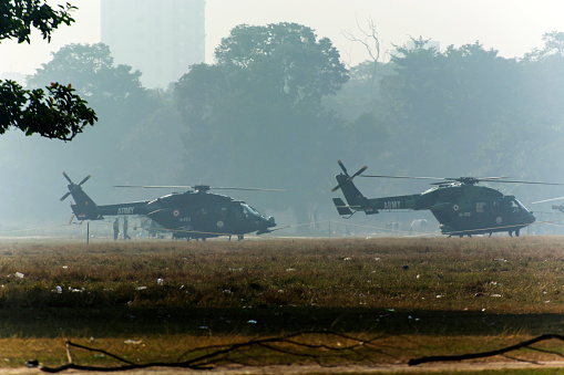 Kolkata, India 15th December 2022. Military helicopter is ready to fly on a ground in a city.