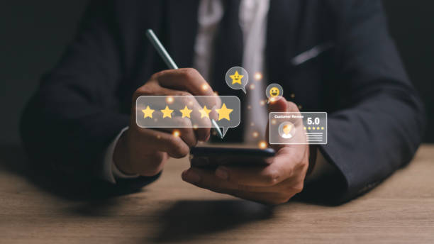 istock User give rating to service experience on online application, Customer review satisfaction feedback survey concept, Customer can evaluate quality of service leading to reputation ranking of business. 1455031208