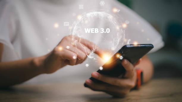 istock Web 3.0 concept image with a woman using a smartphone. Technology and WEB 3.0 concept. 1455031390