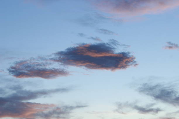 istock Natural landscape of clouds under a pink sunset sky 1455036647
