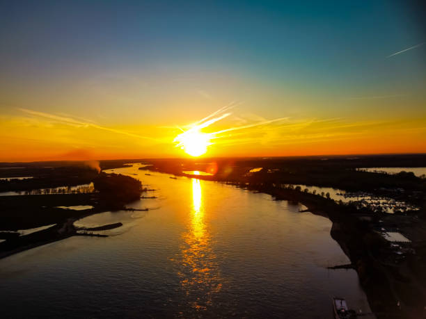 istock High angle shot of a sunset view with a river landscape 1455041718
