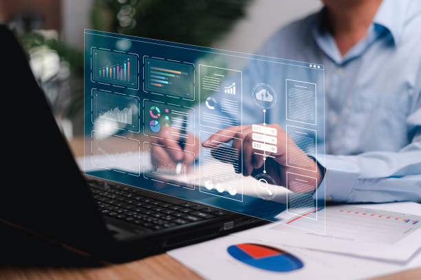 istock Businessman use laptops to work on smart digital marketing analysis and data management, Business strategy concept, Graph and marketing data Digital show on virtual screen, data management 1455044803