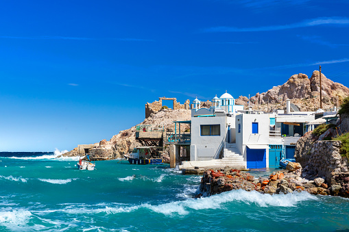 Beach and fishing village of Firapotamos on Milos island, Greece. High quality photo