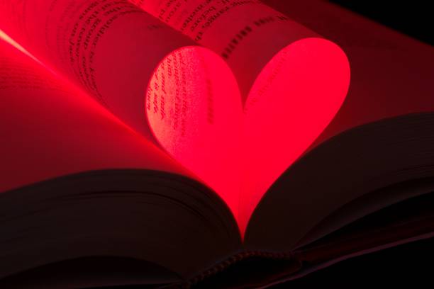istock Red heart made from pages of a romance novel 1455046091