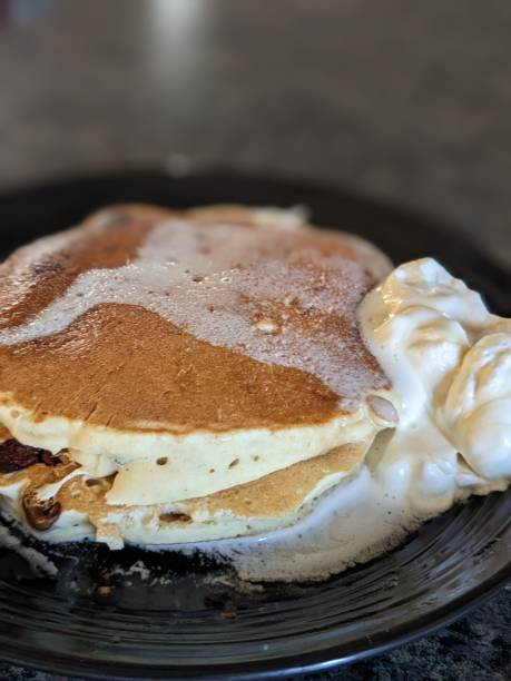 istock Pancakes with fresh whipped cream 1455051419