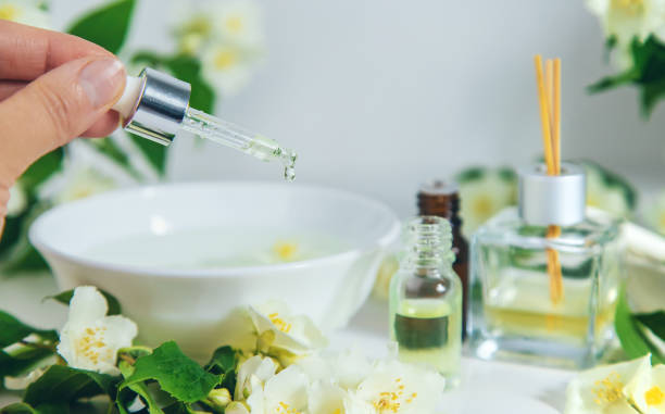 istock Spa salon background jasmine oil. Selective focus. 1455051443