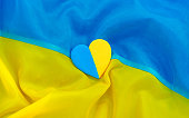 Heart on Ukrainian flag beautiful background. Selective focus.