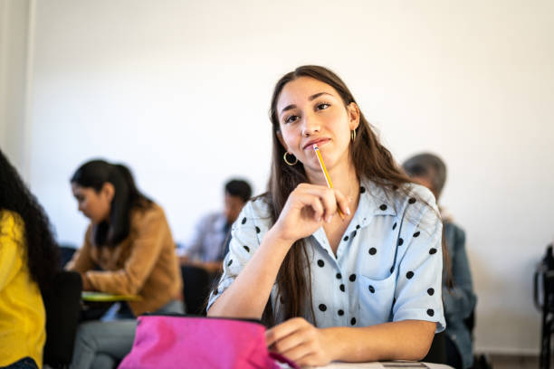 istock Young woman watching class at university 1455053306