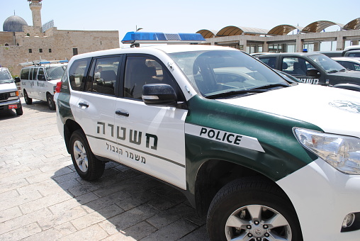 Jerusalem, Israel - May 17, 2012: A police car in Jerusalem in the old city at the Western wall