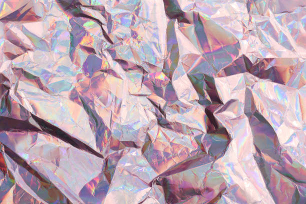 istock metallic crumpled background. Minimal abstract composition. texture background for card or invitation. space for your text.retro color.selective focus 1455065048