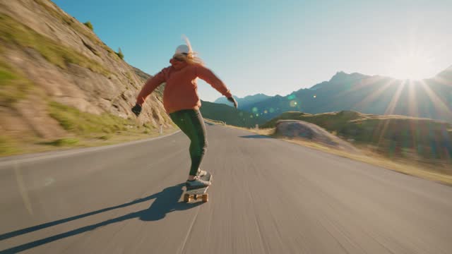Woman doing downhill with longboard