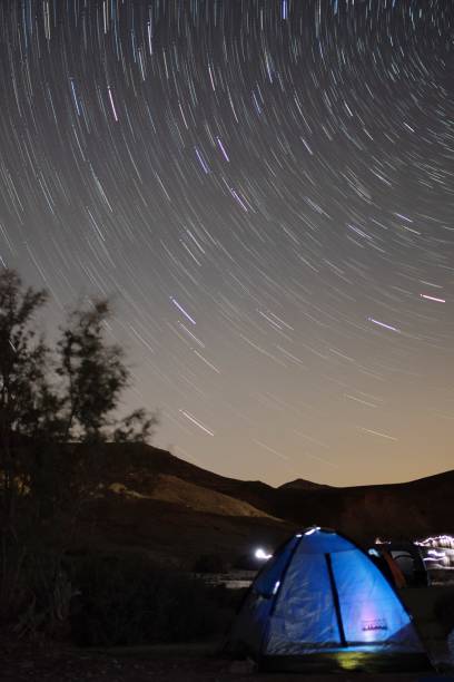 istock Vertical shot of a tent against a starry sky 1455069304