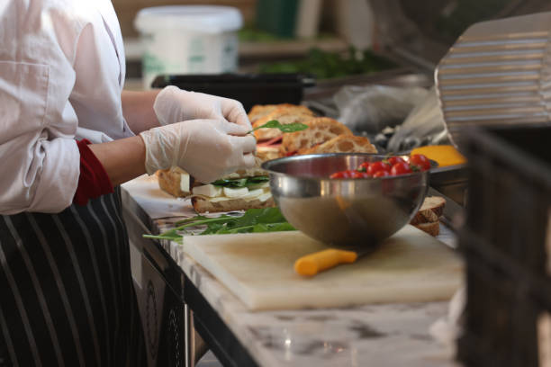 istock Chef preparing sandwiches in the kitchen 1455069389