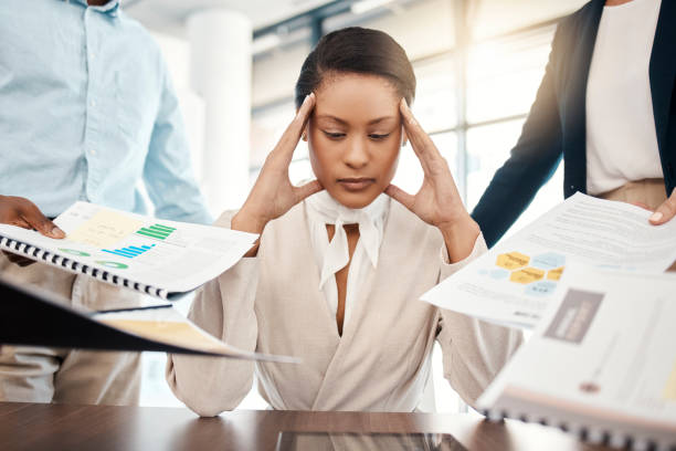 istock Stress headache, burnout and woman overwhelmed with workload with poor time management. Frustrated, overworked and tired lady with tablet at startup office, anxiety from deadline time pressure crisis 1455070819