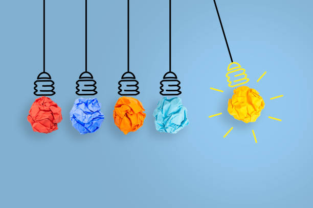 istock Creative Idea Concepts with Light Bulb Crumpled Paper on Blue Background 1455070874