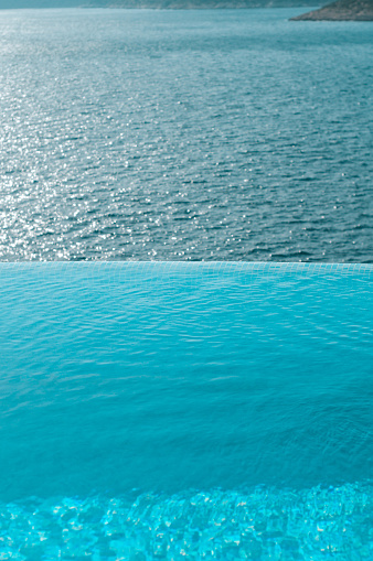 Infinity pool on the bright summer day