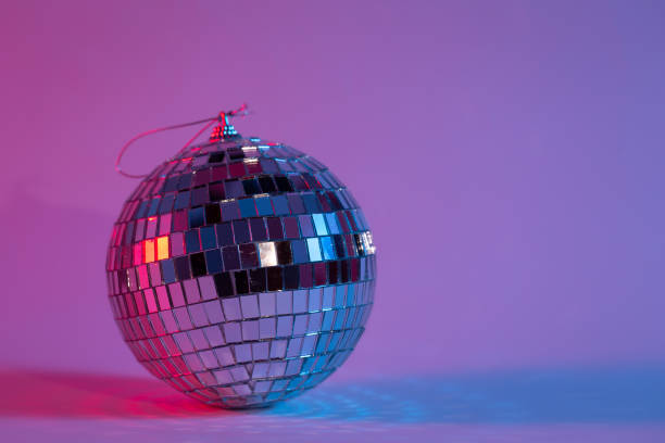 istock Disco ball in neon lighting isolated, copy space. 1455074412