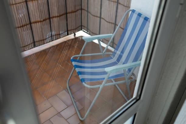 istock beach chair on the balcony at home 1455075192