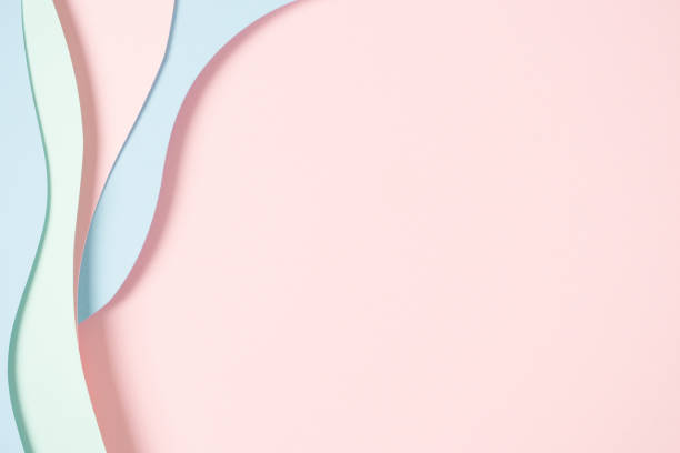 istock Abstract colored paper texture background. Minimal paper cut composition with layers of geometric shapes and lines in pastel green, pink and light blue colors. Top view, copy space 1455077180