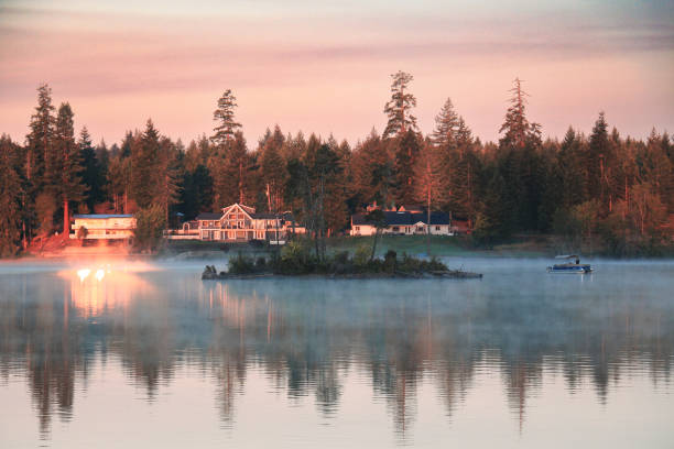 Misty Sunrise on the Lake stock photo