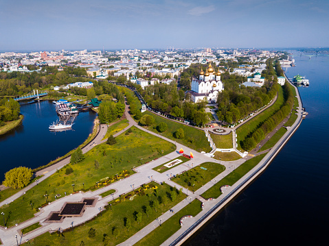 Aerial panoramic view of Yaroslavl cityscape with famous Strelka park and old Assumption Cathedral on sunny summer day, Russia