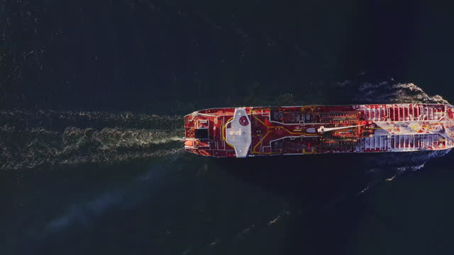 A top down aerial view of the tanker in motion