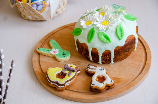 Easter cake detail full with color, chocolate eggs, feathers and candied fruits.