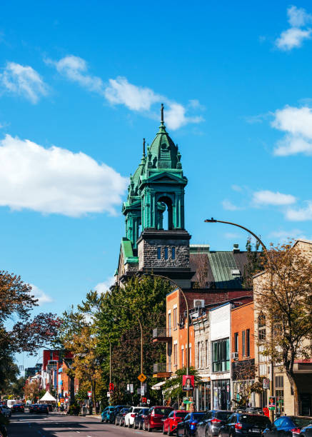Montreal, Canada - Saint Laurent street traffic and crowd in Little Italy district