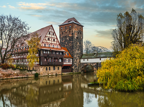 The Weinstadl, wasserturm water tower and Henkerbrücke on the River Pegnitz, Nuremberg, Germany