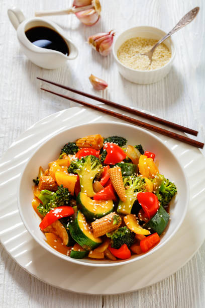 istock veggies stir-fry with thick soy based sauce 1455107020