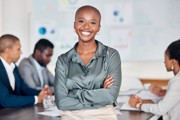 istock Lerder, manager and ceo happy with planning, meeting and company development while team discussing work. Portrait of black woman, boss and mentor in workshop, training or coaching in marketing office 1455108041
