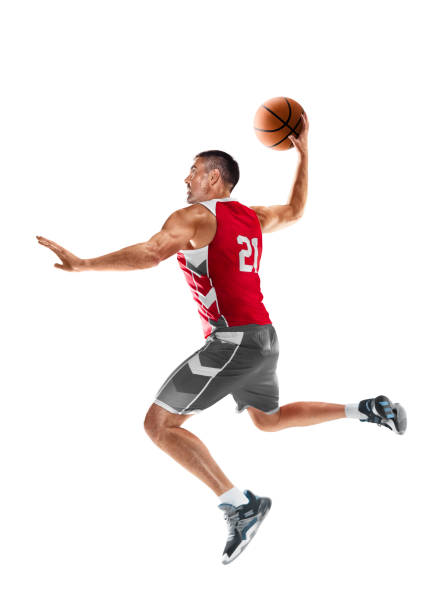 basketball player in a jump. basketball player in motion and action. sport energy. sport emotion. isolated - basketball basketball player shoe sports clothing imagens e fotografias de stock