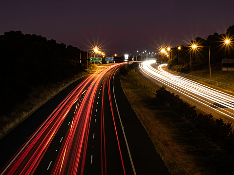 Blurred Motion of Car Lights on Highway at Night