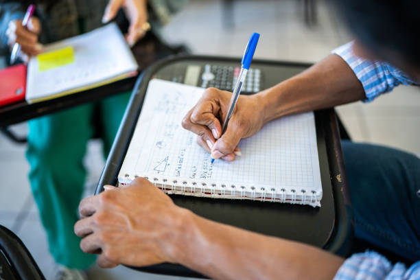 Educational concept background with mathematical formulas and pencils.
